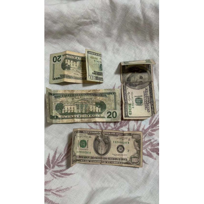 Resgate em dinheiro em dólares mutilados