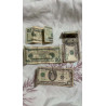Resgate em dinheiro em dólares mutilados